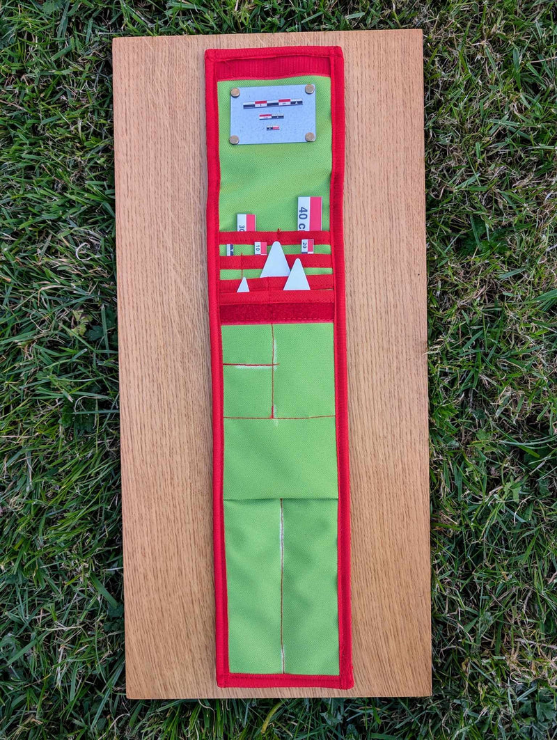 Load image into Gallery viewer, Open CANOMA 40 cm red-white-black archaeological photo-scale kit with north arrows in green-red case on wood
