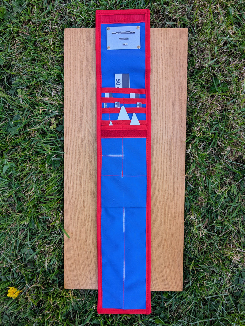 Load image into Gallery viewer, Open CANOMA 50 cm black-white archaeological photo-scale kit with north arrows in blue and red case on wood