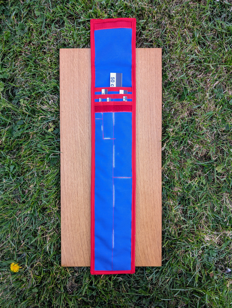 Load image into Gallery viewer, CASE 50 cm black and white archaeological photo scales with open blue and red storage case on wood
