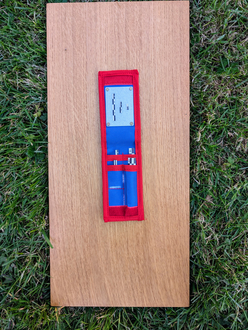 Load image into Gallery viewer, Open Strati Minimix+ red and blue case with small photo scales and accessories on wood over grass