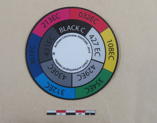Chargez l'image dans la visionneuse de la galerie, Medium circular Strati SCD colorimeter disk with multicolor and greyscale Pantone segments on beige background