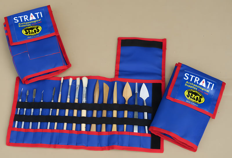 Load image into Gallery viewer, SCADS three-section archaeology tool case shown open and closed with brushes, picks and trowels on beige background