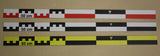 Three flat 50cm archaeological photo scales in RWB, BW and BY arranged in parallel on beige background. Made in France.