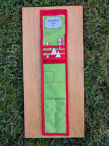 Open CANOMA 40 cm red-white-black archaeological photo-scale kit with north arrows in green-red case on wood