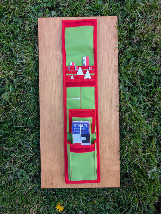 Open CANO 40 cm CANVAS photo scale kit with folded scales in a green and red Strati roll case