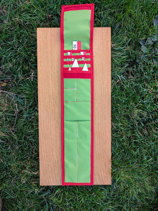 Open CANO 50 cm archaeological photo-scale kit with red-white-black scales and north arrows in green-red case