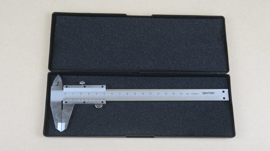 150 mm stainless steel precision caliper displayed in its black foam storage case