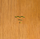 Three magnetic photo scales (5cm, 2cm, 1cm) in black-yellow on wood surface. Flexible magnet material. For lab and field use.